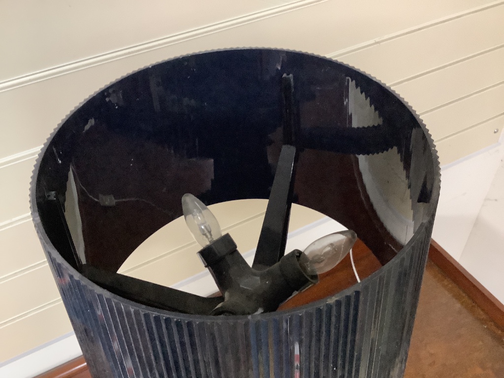 A Philippe Starcke black plastic table lamp with shade, height 76cm